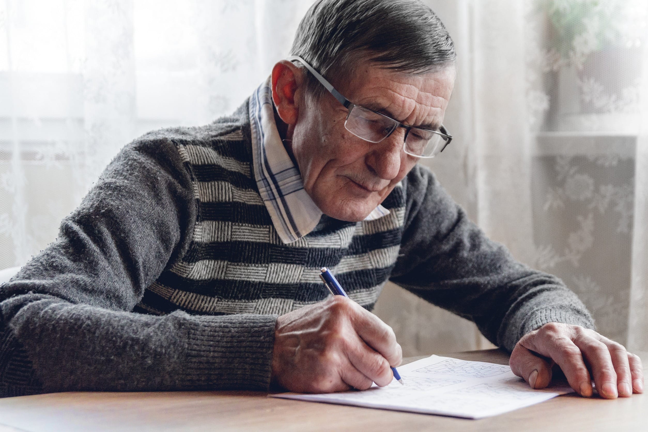 Retiree writing