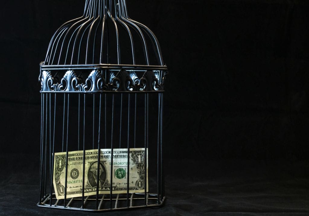 money in a cage